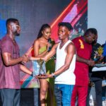 Abubakar Mahama Buku [Glee Jeezy] receiving award at shobiz and influencers awards Accra
